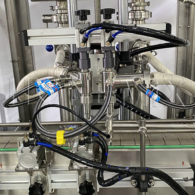 Verwarmde vaselinecrème vulmachine Twee mondstuk kappen afdichting etiketteringslijn