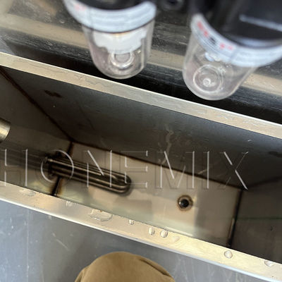 Cosmetische verwarmde balsemvulmachine semi-automatische verticale vulmachine