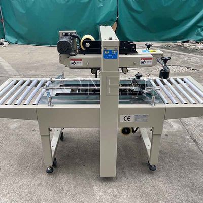 220V / 50HZ Automatische verpakkingsmachine 12mm kartonnen doos afdichter Kleefband