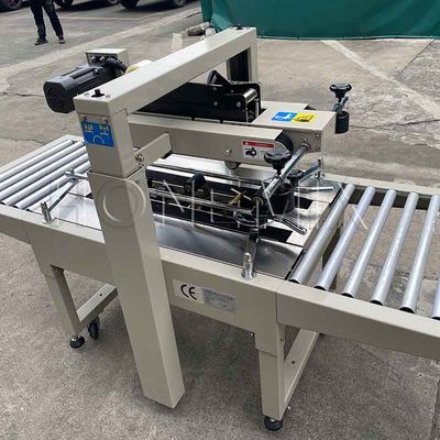 220V / 50HZ Automatische verpakkingsmachine 12mm kartonnen doos afdichter Kleefband
